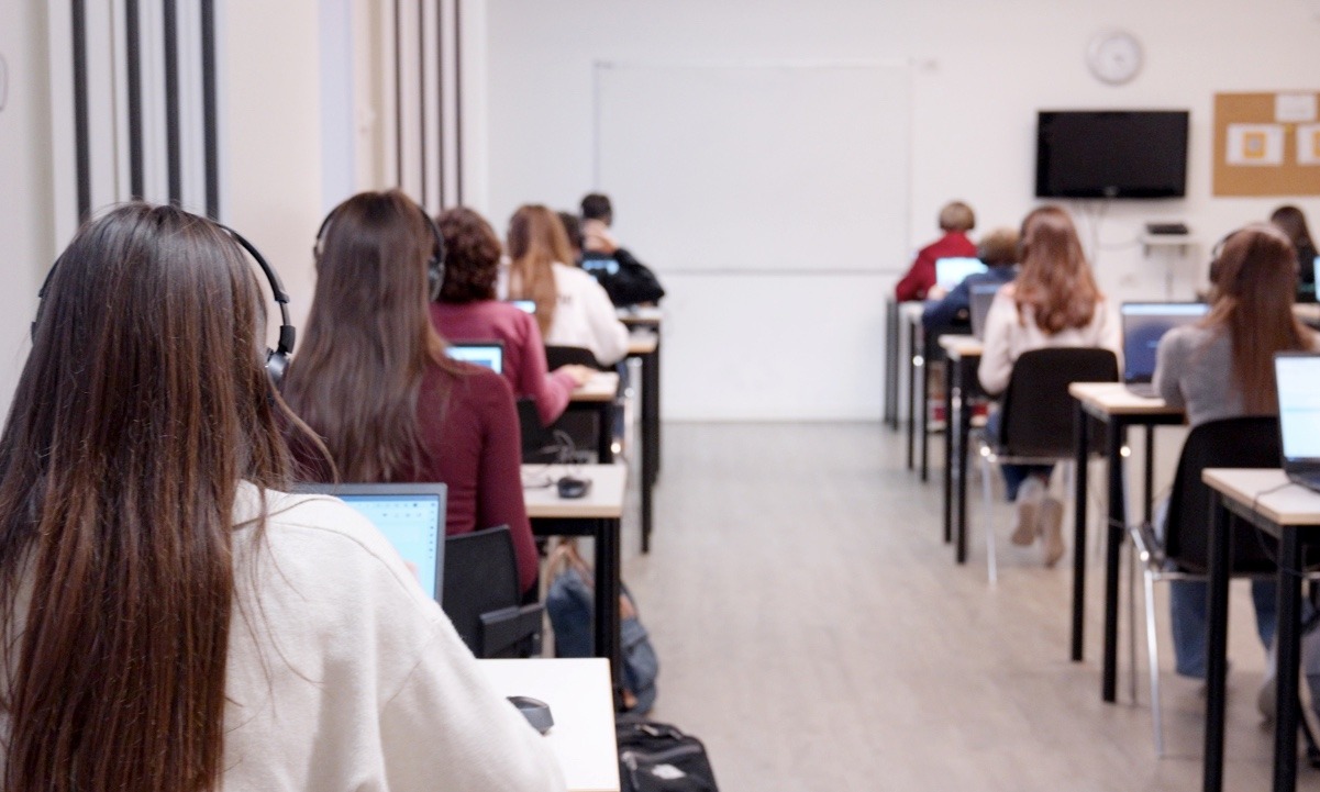 Students taking a digital exam Students taking a digital exam