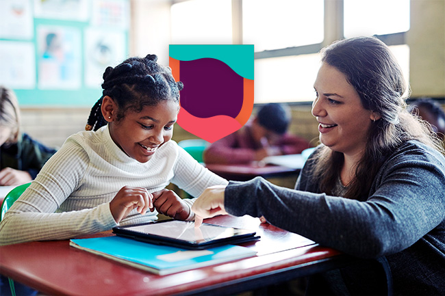 Teacher with smiling happy learner